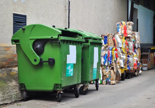 Recycling materials being sorted by builders waste clearance team